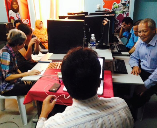 Six blind members from Sarawak Society for the Blind having ICT training